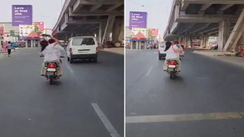 موٹر سائیکل پر بیوی کی شوہر کو چپل سے زبردست پٹائی؛ ویڈیو وائرل ہوگئی