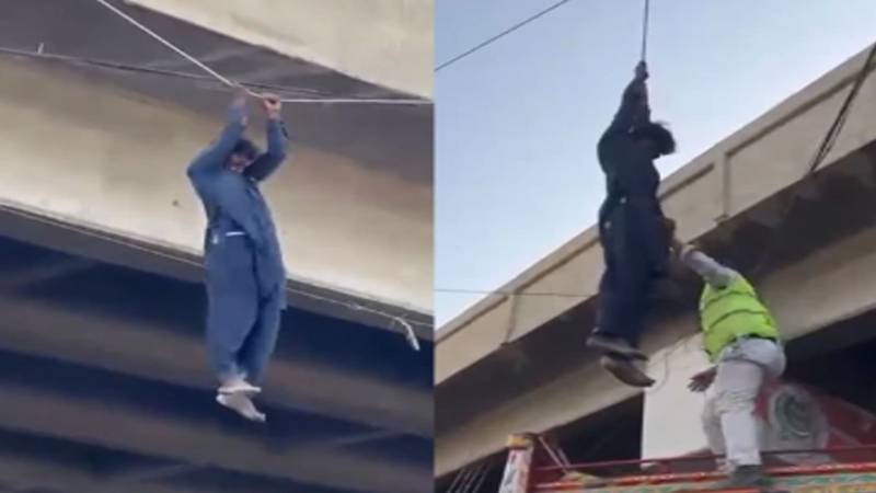 کراچی: نشے کے عادی شخص کا پل کی حفاظتی دیوار پھلانگ کر تاروں سے لٹکنے کا واقعہ، ویڈیو وائرل